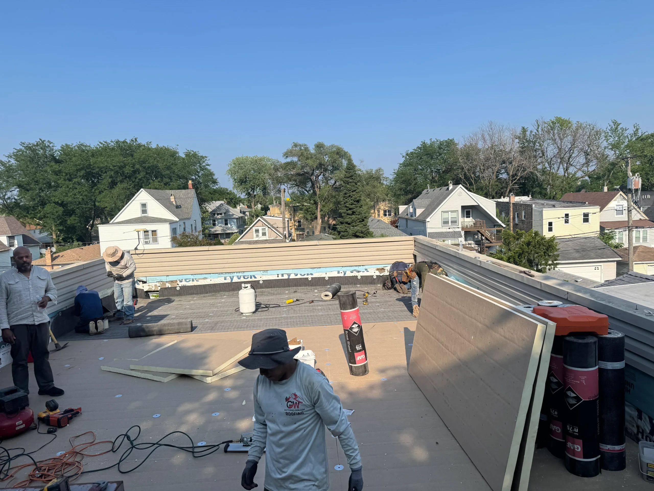 Specialized flat roof solutions including TPO, EPDM, and modified bitumen for Chicago businesses.